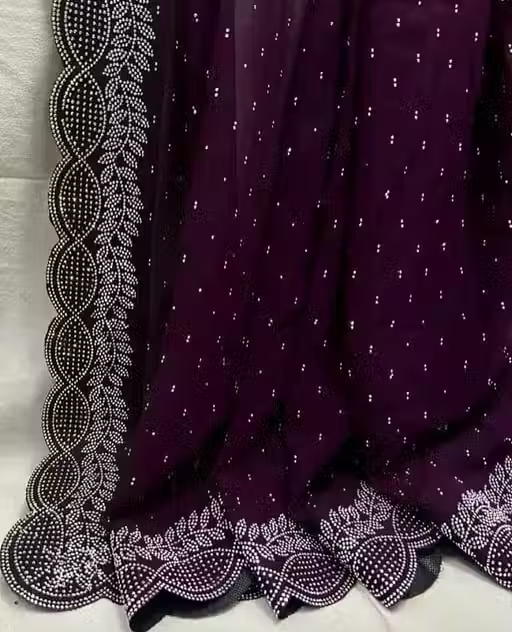 Georgatte febric with purple/wine color designer saree