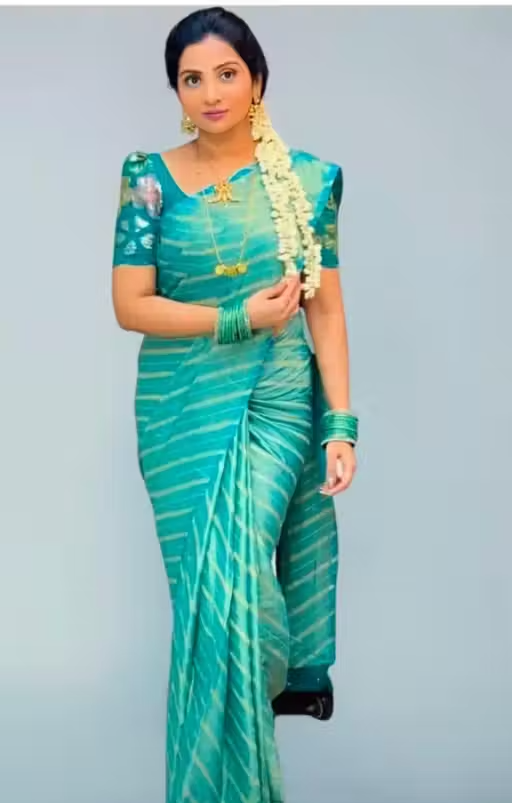 BRASSO FOIL SAREE WITH FANCY BLOUSE
